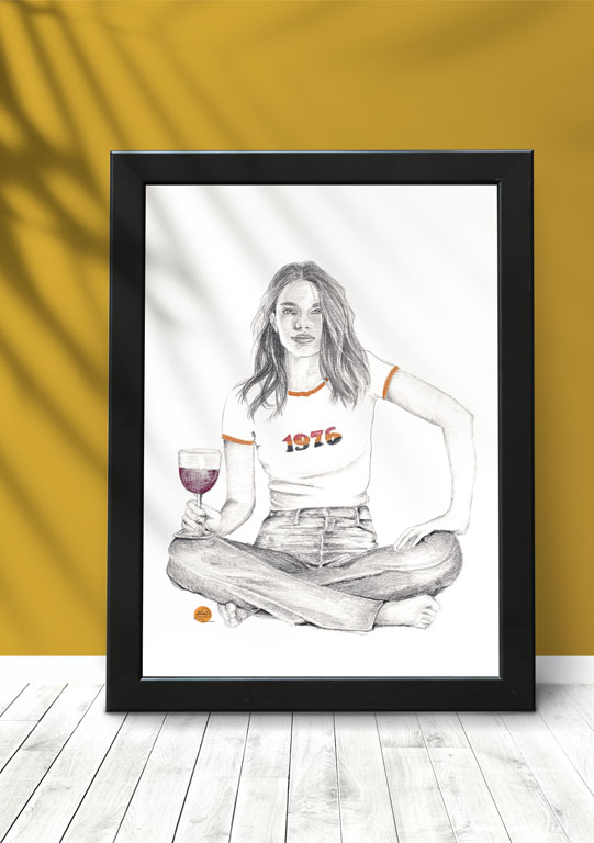 affiche dans cadre noir de femme dans un style vintage assise en tailleur