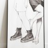 dessin au crayon de jambes féminines dans un cadre