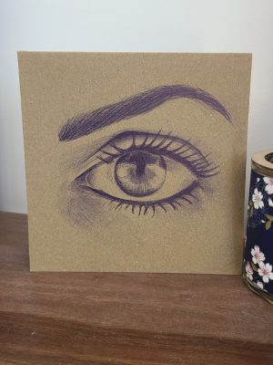 dessin au stylo d'un œil au regard intense